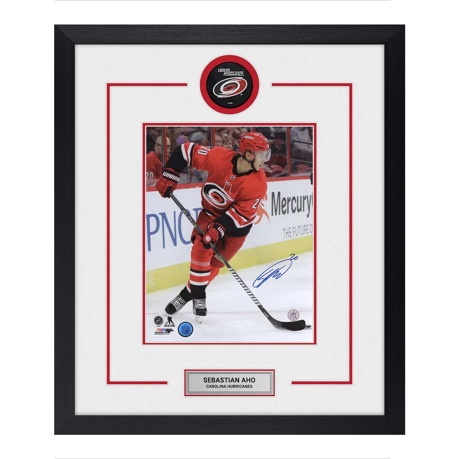 Sebastian Aho Autographed Carolina Hurricanes Puck Logo 23x27 Frame