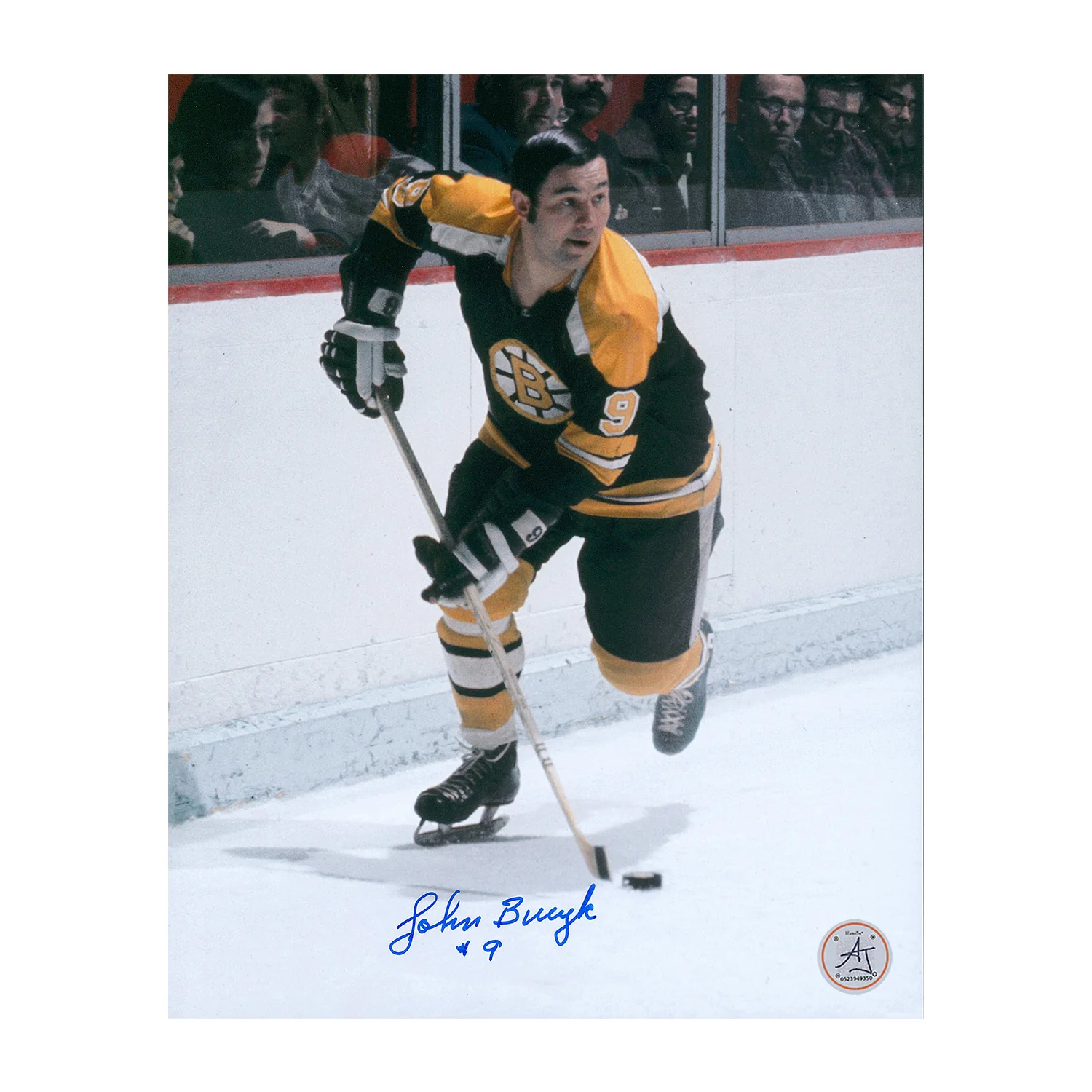 Johnny Bucyk Autographed Boston Bruins Puck Rush 8x10 Photo