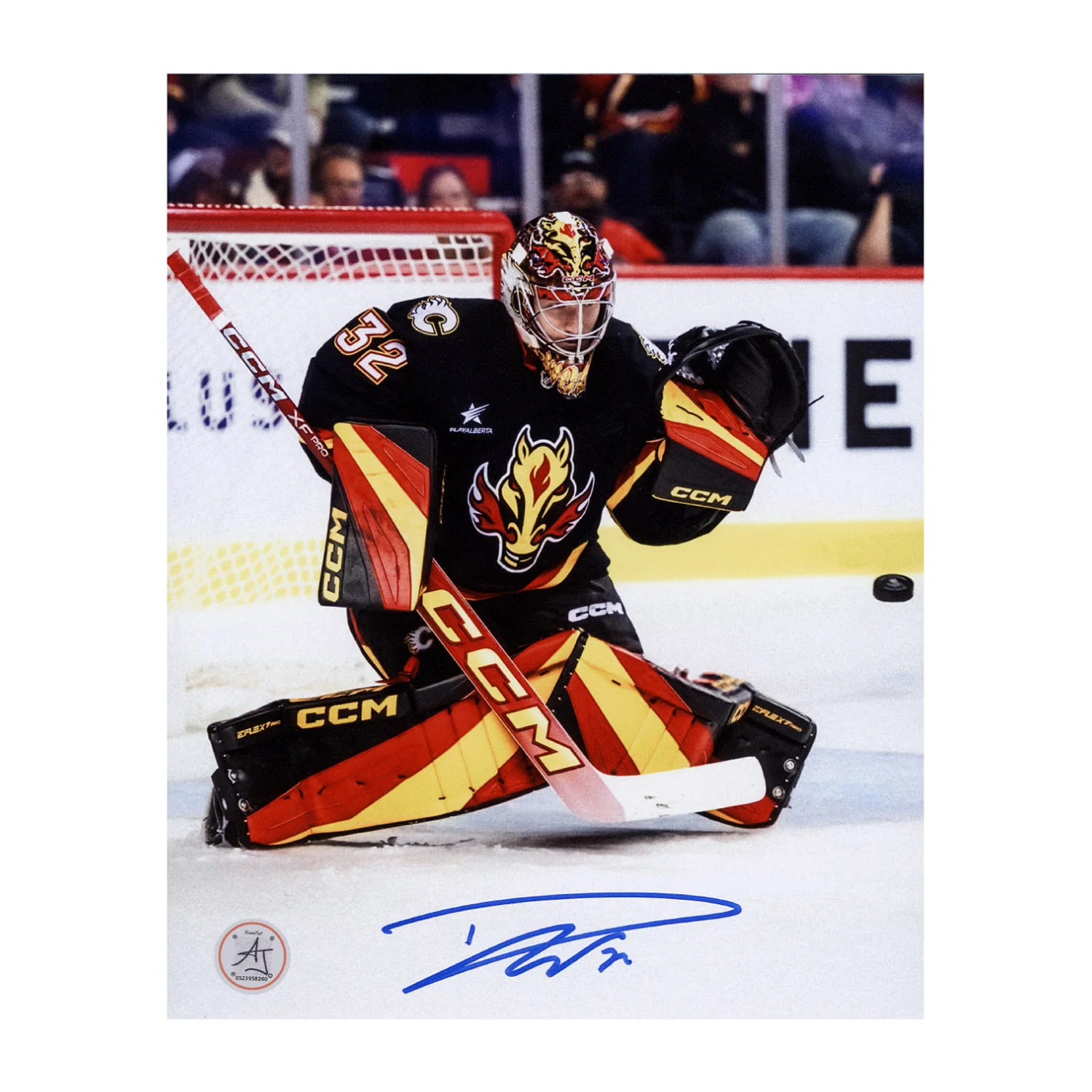 Dustin Wolf Autographed Calgary Flames Glove Save 8x10 Photo